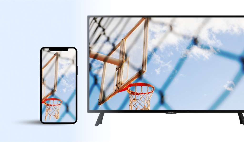 An iPhone and a Samsung TV dispaying the same image of a basketball basket