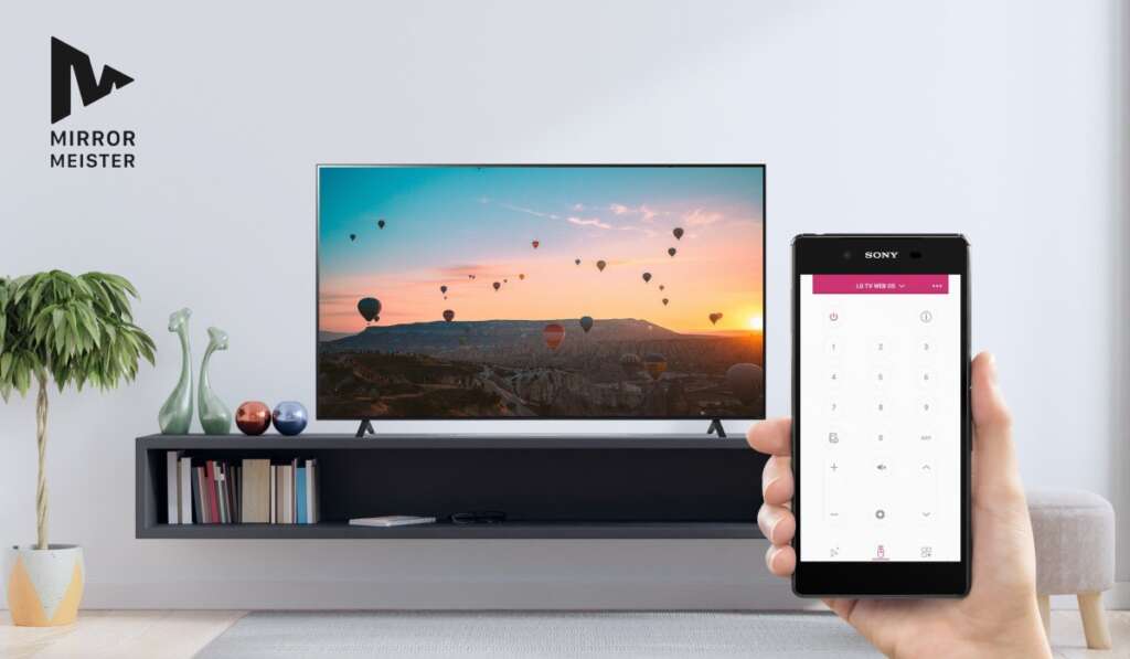 An LG TV on a modern TV stand. An Android smartphone with LG TV remote app